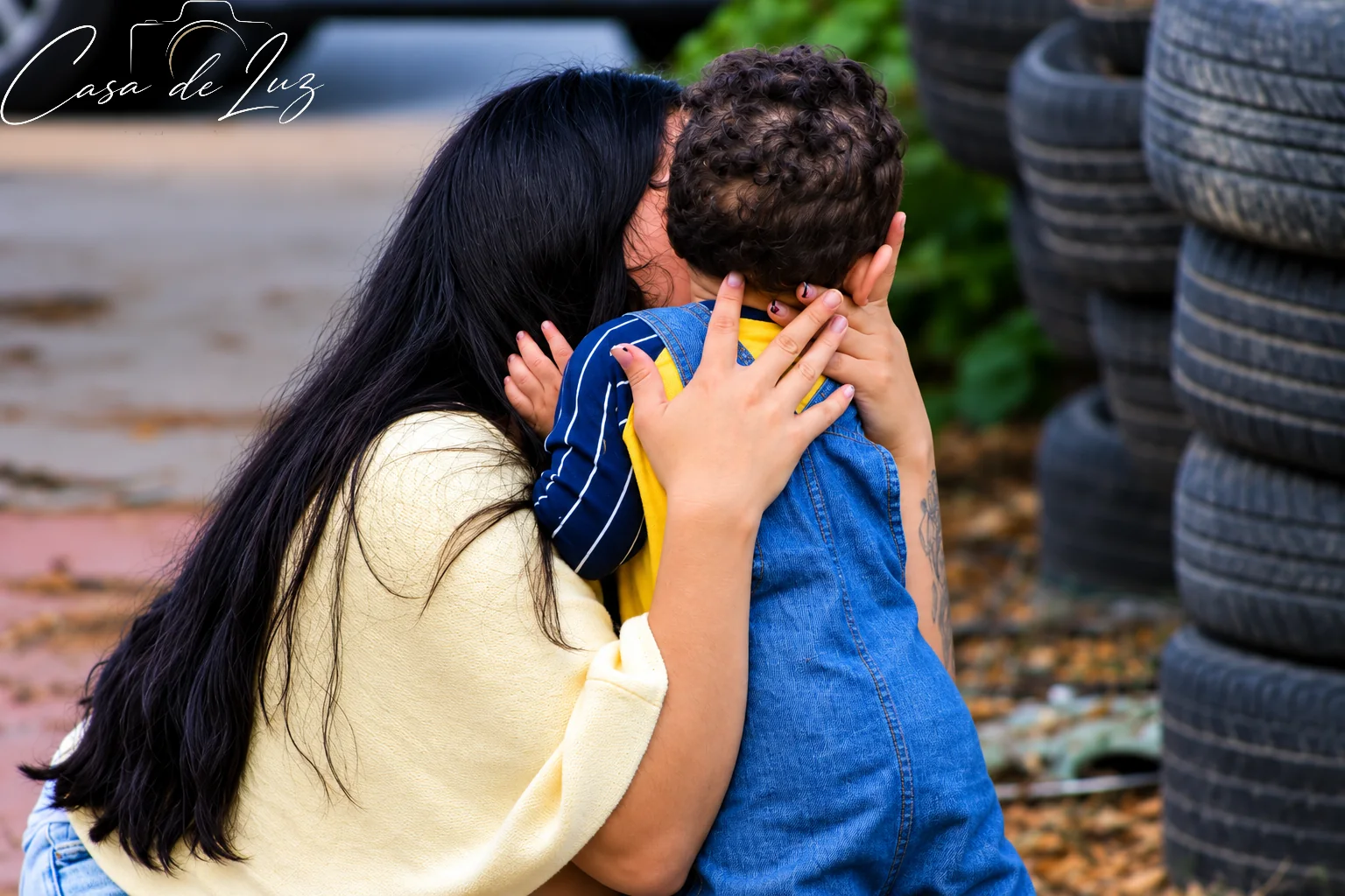 Mother holding her young child